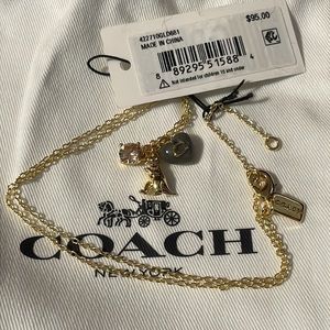 Coach gold necklace